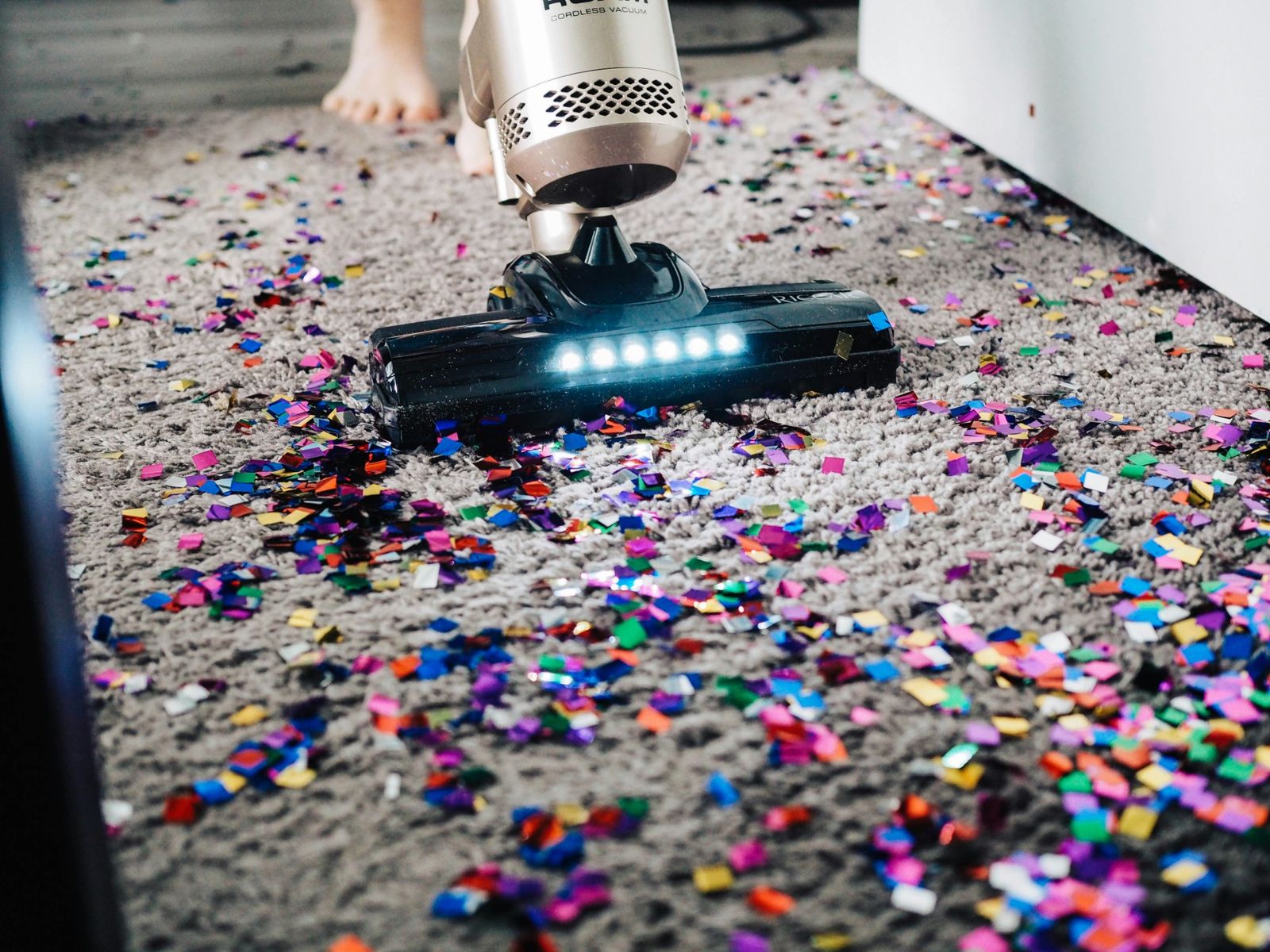 Vacuum lifting debris from carpet after an event