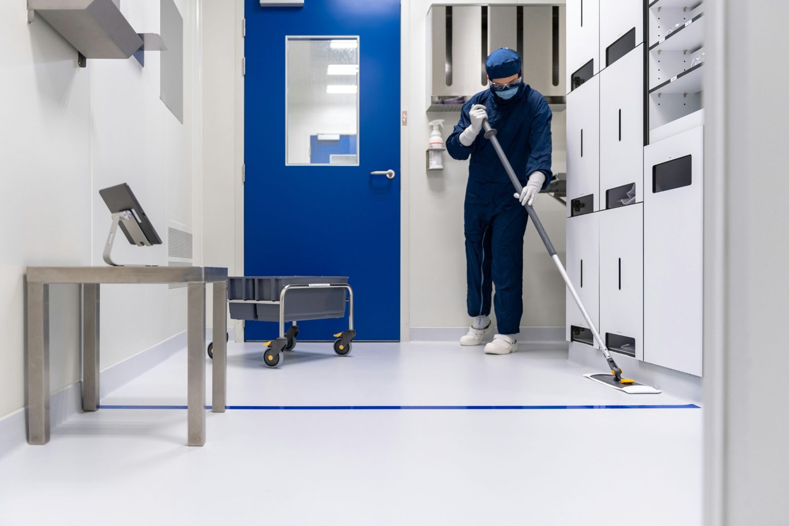 Janitorial technician detailing a clean facility